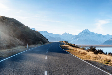 Highway to Mt. Cook along Lake Pukaki in South Island of New Zealand on a clear day