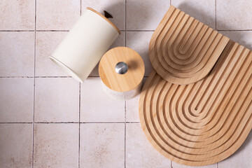 kitchen boards, storage jars. beige kitchen tile background