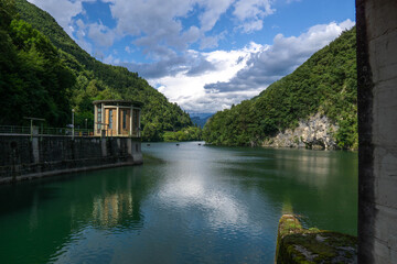 Fototapeta premium Corlo Dam on Lago del Corlo, Belluno, Italy