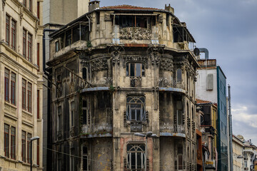 Dilapidated historic art nouveau building with ornate facade in Istanbul, Turkey