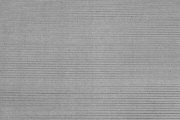Textura de cartón con superficie ondulada en color gris
