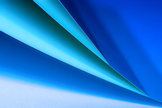 Colorful abstract curves in shades of blue tints creating a dynamic visual experience
