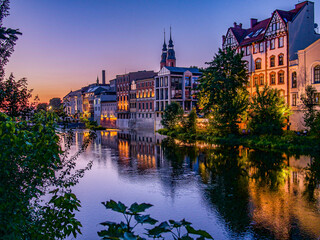 Beautiful sunset on Venezia like canal in polish city Opole, Polska in teal orange colors © mduraj
