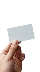 Hand holding a blank white card for text or design against a solid black background