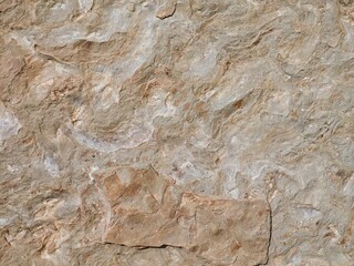 Natural stone texture with beige and earthy tones