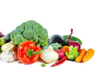 Fresh shiny multicolored vegetables isolated on white background.