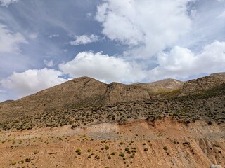 Mountain slopes under cloudy skies in the Atlas Mountains region