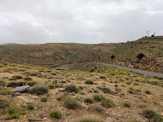 Fototapeta premium Scenic natural landscape, Atlas Mountains with vegetation and hills
