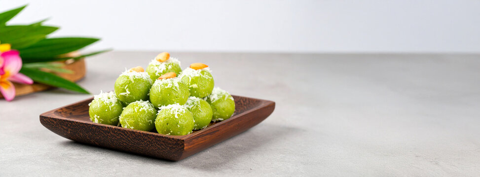 Malaysian Kuih Seri Muka Layered Pandan and Glutinous Rice Cake with copy space. Southeast Asian Street Food