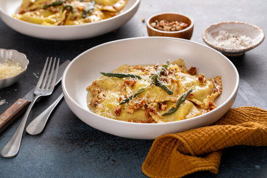 Pumpkin ravioli with brown butter pecan sauce and sage