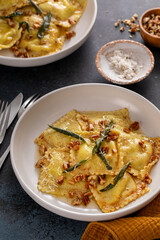 Pumpkin ravioli with brown butter pecan sauce and sage