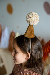 Naklejka premium girl in party hat. boho birthday