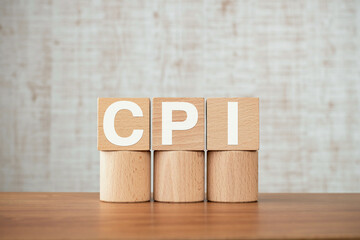 There is wood cube with the word CPI. It is an abbreviation for consumer price index as eye-catching image.