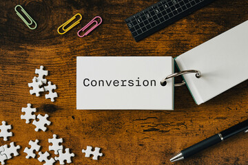 There is word card with the word Conversion. It is as an eye-catching image.