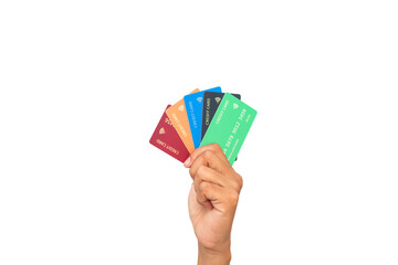 Hand holding multiple colorful credit cards against a clean white background, financial diversity