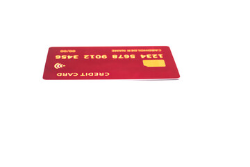 Close-up of a Red Credit Card on a White Background, Representing Banking and Payments