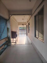 Indoor Corridor with Natural Light and View to Outdoor Area Architecture and Interior Design with Minimalist Style