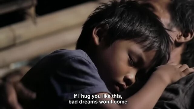 A child sleeping nestled in an adult's embrace.  A heartfelt sentiment of comfort and protection