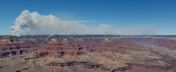Grand Canyon from the south rim towards a section of the Dragon Bravo mega fire burning on the...
