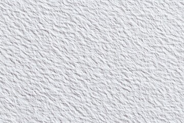 Abstract textured surface of light gray.  A subtly uneven, ridged pattern