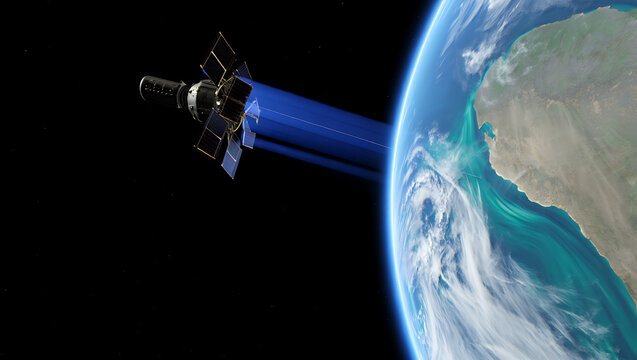 A sophisticated satellite transmits a powerful beam of blue light towards earth s atmosphere orbiting above the planet s curved surface in the vastness of space