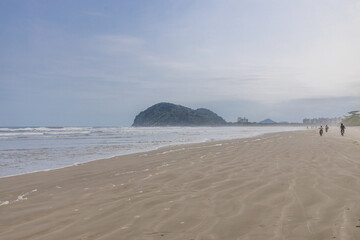 paradisiac beach in Bertioga São Paulo, with cloudy sky a beautiful and calm place.