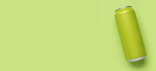 Can of soda on green background with space for text. Mockup for design