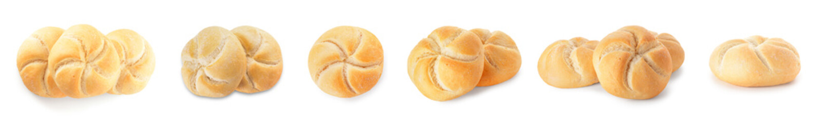 Set of delicious kaiser rolls on white background