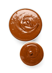 Bowls of tasty melted chocolate on white background
