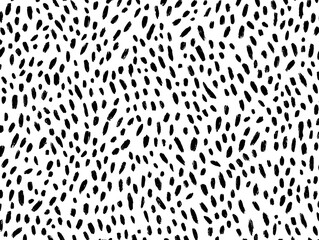 Abstract pattern of black brushstrokes on white.  A repeating design of elongated, irregular dots