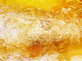 Gild texture on gold buddha statue background, Which Buddhist people use to worship The sacred