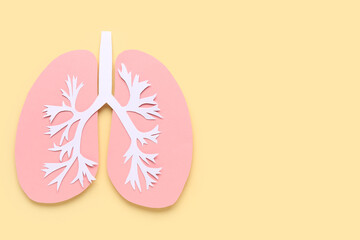 Paper lungs on beige background