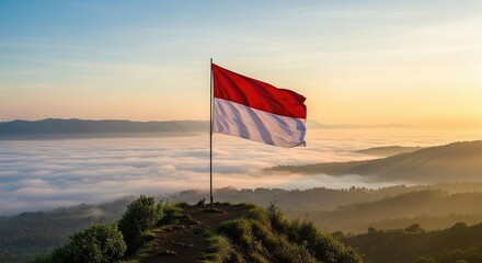 Flag waving over mountain sunrise