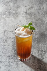 ice tea with lychee on top 