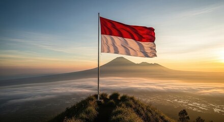 National flag waving over mountain sunrise