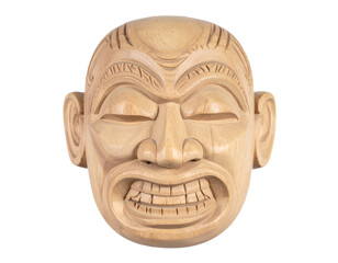 Intricately carved wooden tribal mask with intense expression and detailed features