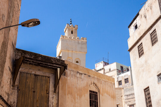 A Minaret Protrudes from a Mosque in the Fes Morocco Medina