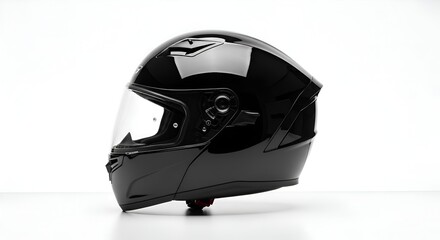 Fototapeta premium Side view of a simple modern motorcycle helmet with glossy black finish, clean and white backgroun