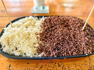 A plate divided, a balance of cheesy goodness and rich chocolatey swirls.