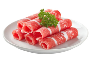 Sliced beef rolls with distinct white fat marbling, presented on a white plate, ready for cooking or serving.