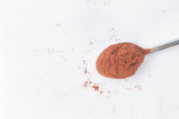 Chocolate powder on white background
