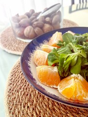 Salad with oranges and arugula.