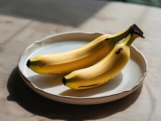 Fresh banana on a plate with ccol backgrounf