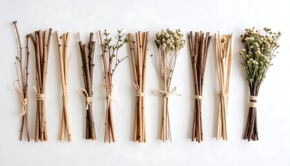 Ten small bundles of twigs and dried flowers, tied with twine, arranged in a row on a light background