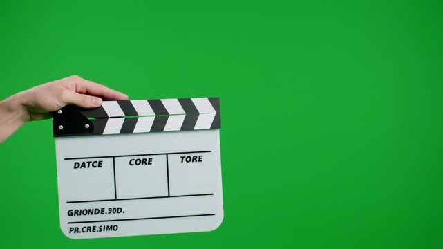Hand Clapping Film Clapperboard on Green Screen for Video Production