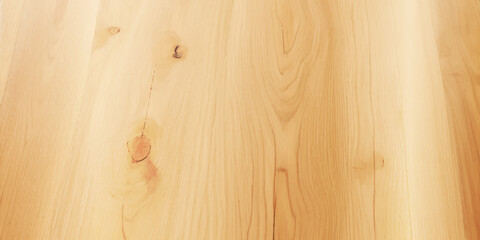 Fototapeta premium A Gentle, Golden Light Spills Across the Wooden Surface, Enhancing the Natural Warmth of Its Grain and Creating a Beautifully Radiant, Earthy Background 
