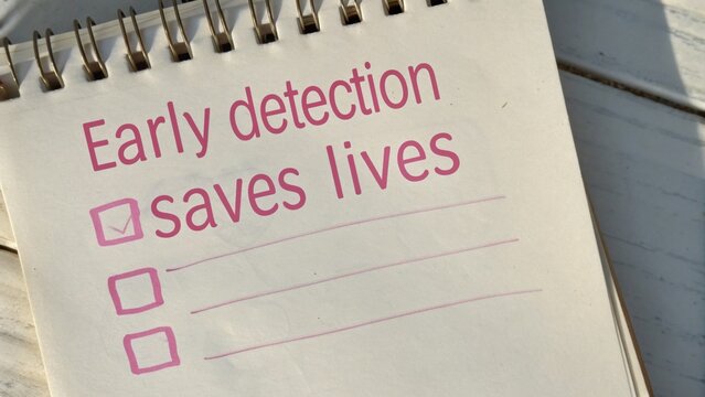 A notepad emphasizes the importance of early detection in saving lives, featuring checkboxes for tasks or reminders.