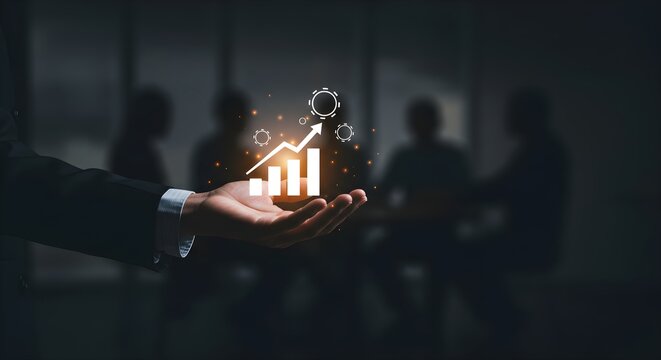 Businessperson's hand displays upward trending graph, symbolizing post-pandemic economic recovery and team success.