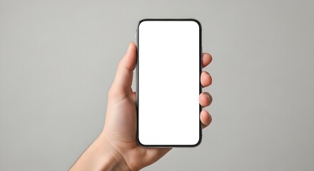 Man's Hand Holding a Modern Smartphone with Blank White Screen for Mockup on a Gray Background