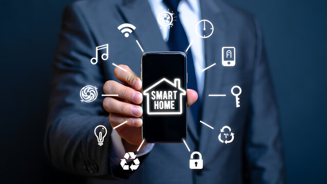Businessman holding smartphone with smart home icons technology connectivity